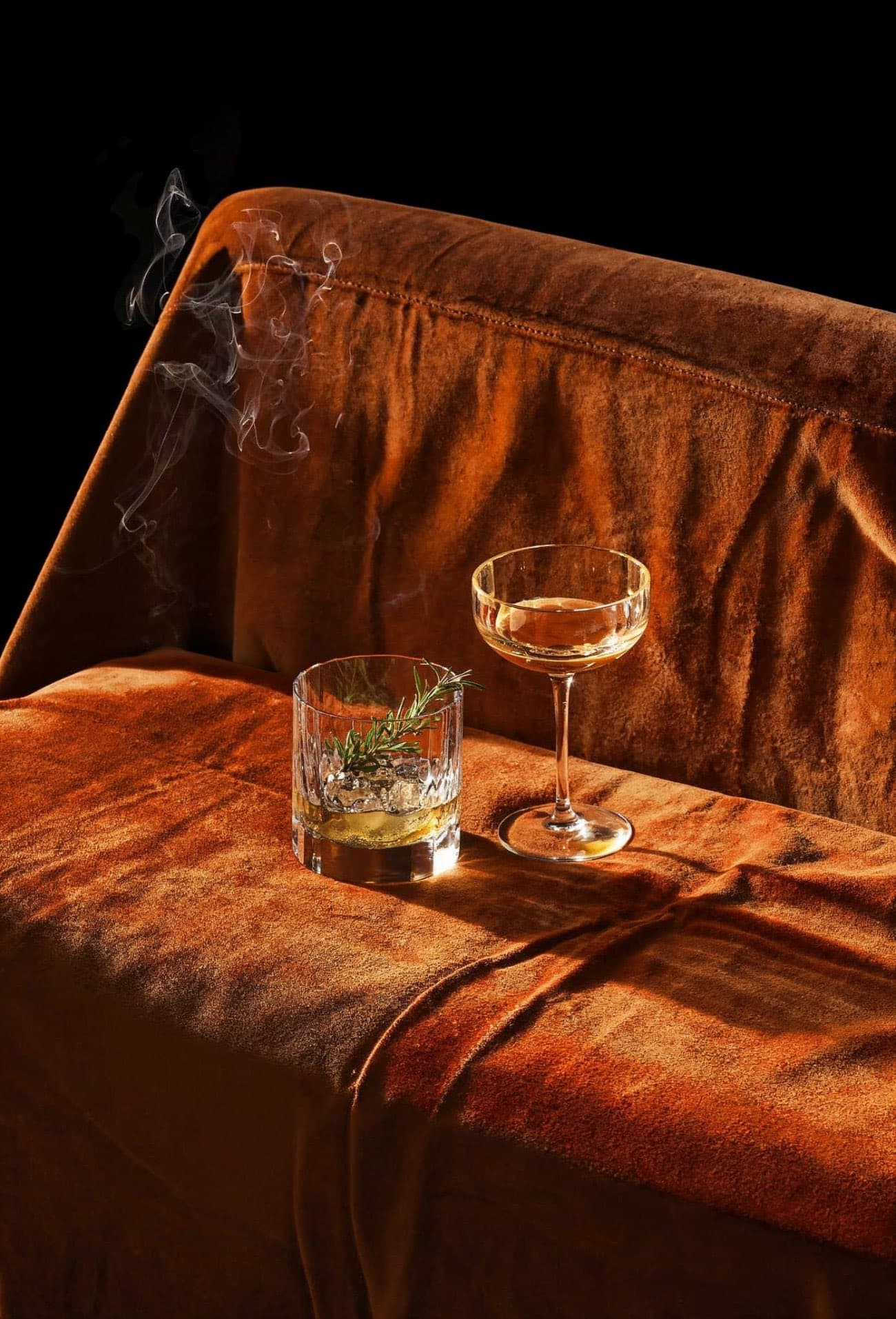 The private VIP Box room at Aura, wrapped in velvet and low light
